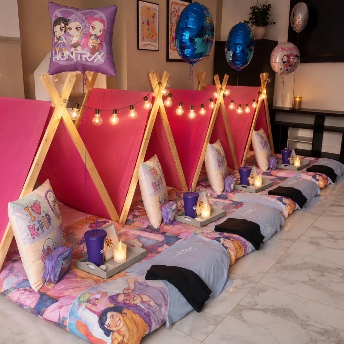 Character themed teepees set up for a sleepover party